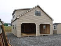 Pine Creek 24x28 Two Story Cape Cod Garage with Artisan Clay walls, Warm Sandalwood trim and Bronze shutters, and Burnish Slate metal roof