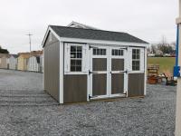 Pine Creek 10x12 HD New England Peak with Driftwood Polyurethane walls, White shutters White trim, and Charcoal shingles