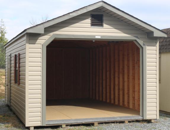 Pine Creek 12x20 Peak Garage with Pebble Clay walls, Clay trim and Red Raised Panel shutters, and Barkwood shingles