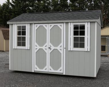 Pine Creek 8x12 HD Peak with Light Gray walls, White trim and White shutters, and Charcoal shingles