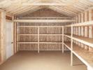 12x24 Peak Style Storage Shed with Vinyl Siding and Workshop Shelving Package