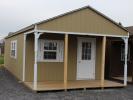 14x32 Peak White Deer Cabin with Buckskin walls, White trim, and shutters, and Barkwood shingles